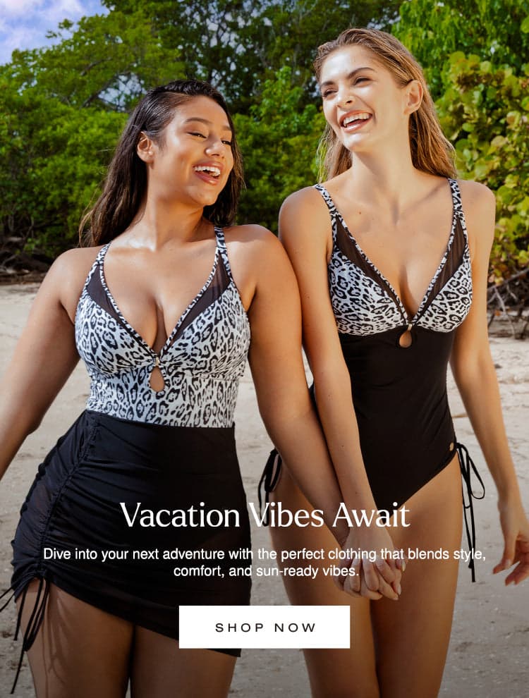 Two women in swimsuits with text 'Vacation Vibes Await' and 'Shop Now' on a beach.