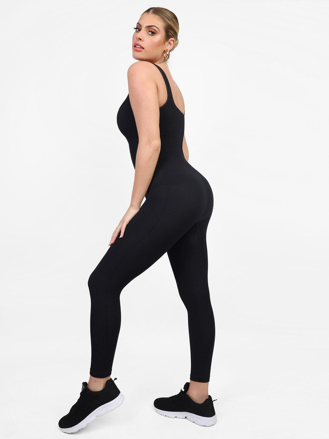 Stylish black sport jumpsuit by Popilush®, perfect for active women, shapewear.