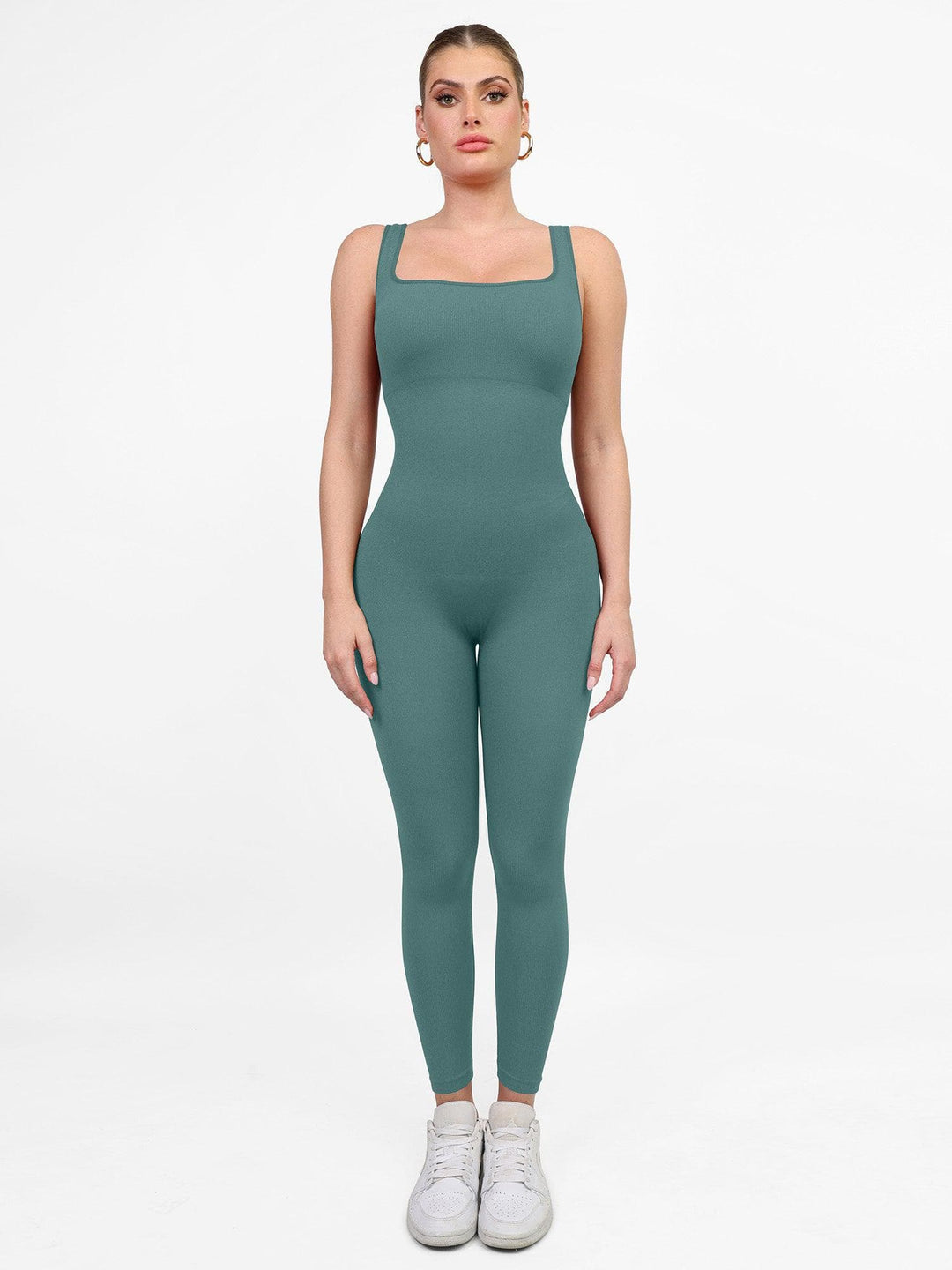 Teal sport jumpsuit with square neck by Popilush®, comfortable activewear.