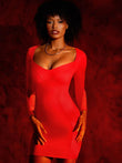Woman in a Popilush® red sweetheart mini dress, with built in shapewear