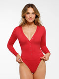 Red long sleeve V-neck bodysuit with snap closures and tummy control.