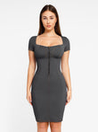 Bodycon denim dress by Popilush® with zipper front, shows shapewear design.