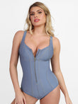 Blue imitation denim sculpting bodysuit with antique bronze zipper and contrast stitching.