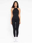 Black halter jumpsuit, a streamlined design by Popilush® for confident wear.