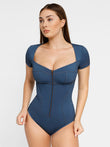 Slimming blue denim-look shapewear bodysuit, short sleeve, V-neck, front zipper.