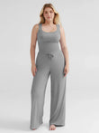 Grey modal tank top and wide-leg drawstring pants pajama set on a model.
