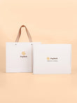 Premium Popilush gift box and shopping bag for stylish gift giving.