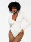 White Redtag thermal tummy control bodysuit, long sleeve, deep V-neck, buttons.
