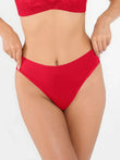 Seamless ribbed-waist brief in red, featuring a wide waistband and comfortable leg openings.