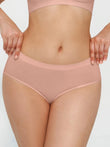 Nude pink seamless high-waist brief with a gentle-support waistband and eco-friendly fabric.