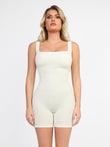 Seamless square neck one piece sport romper in ivory ribbed fabric, mid-thigh length.