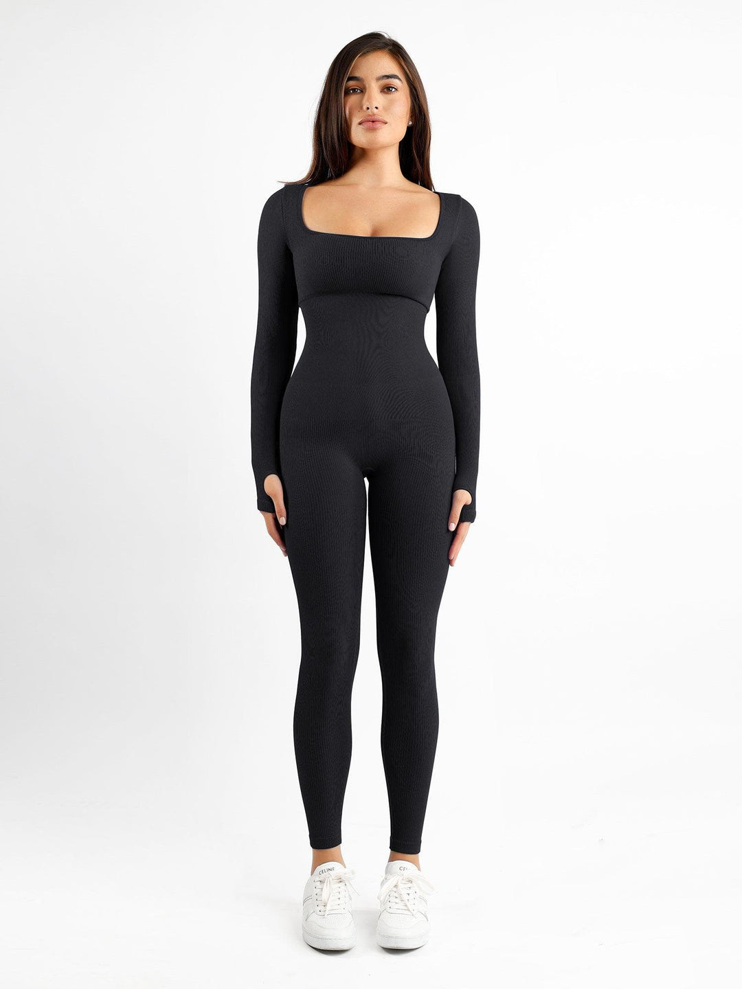 Modern fashion: Black square neck long sleeve Popilush® jumpsuit with thumb holes.