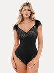 Black cap sleeve slimming shapewear bodysuit with detailed lace cups