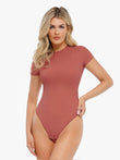 Popilush® shapewear: Model in a form-fitting, short-sleeved bodysuit.