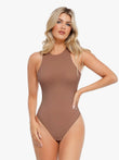 Light brown, sleeveless, round neck bodysuit with a seamless, sculpted fit for all-day comfort.