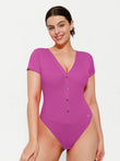 Purple ribbed short-sleeve bodysuit with deep V-neck and functional button front.