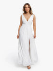 White deep V-neck maxi dress with a high front slit and flowing skirt.
