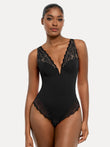 Shapewear bodysuit: black, deep V-neck, sculpting lace inset design.