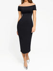 Woman wearing a black off-shoulder seamless shapewear dress and silver heels.