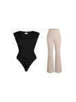 Black square-neck padded shoulder bodysuit paired with beige flare-leg pants.