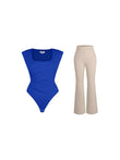 Blue padded shoulder bodysuit paired with beige flare-leg pants