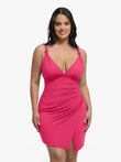 Sculpting pink mini dress with twist straps, ruched waist, and side slit.