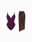 Purple one-piece swimsuit with a plunging neckline paired with a leopard print mesh cover-up skirt.