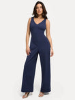 Navy blue sleeveless V-neck slimming wide-leg shapewear jumpsuit on woman.