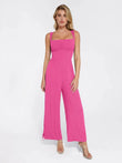Pink square neck wide-leg jumpsuit with adjustable tie leg detail.