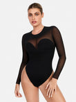Black illusion mesh long sleeve shapewear bodysuit with tummy control.