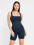 Navy blue ribbed square neck shapewear tank romper with shorts.