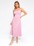 Woman in pink A-line midi dress by Popilush®; shapewear design