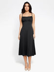 Black built-in shapewear A-line midi slip dress with bust support and adjustable straps.