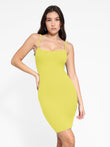 Popilush® shapewear dress: Woman in yellow mini slip dress for comfortable shaping