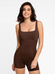 Woman wearing brown Popilush® shapewear romper with a square neckline, showing both style and shaping features.