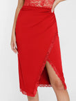 Red midi shapewear skirt with ruched waist and elegant lace trim on slit.